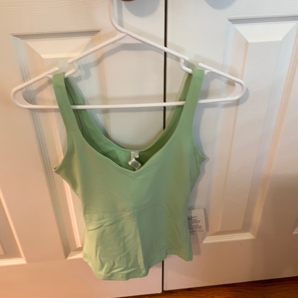 NWT Lululemon Align waist length tank. Size 6. Mint color.